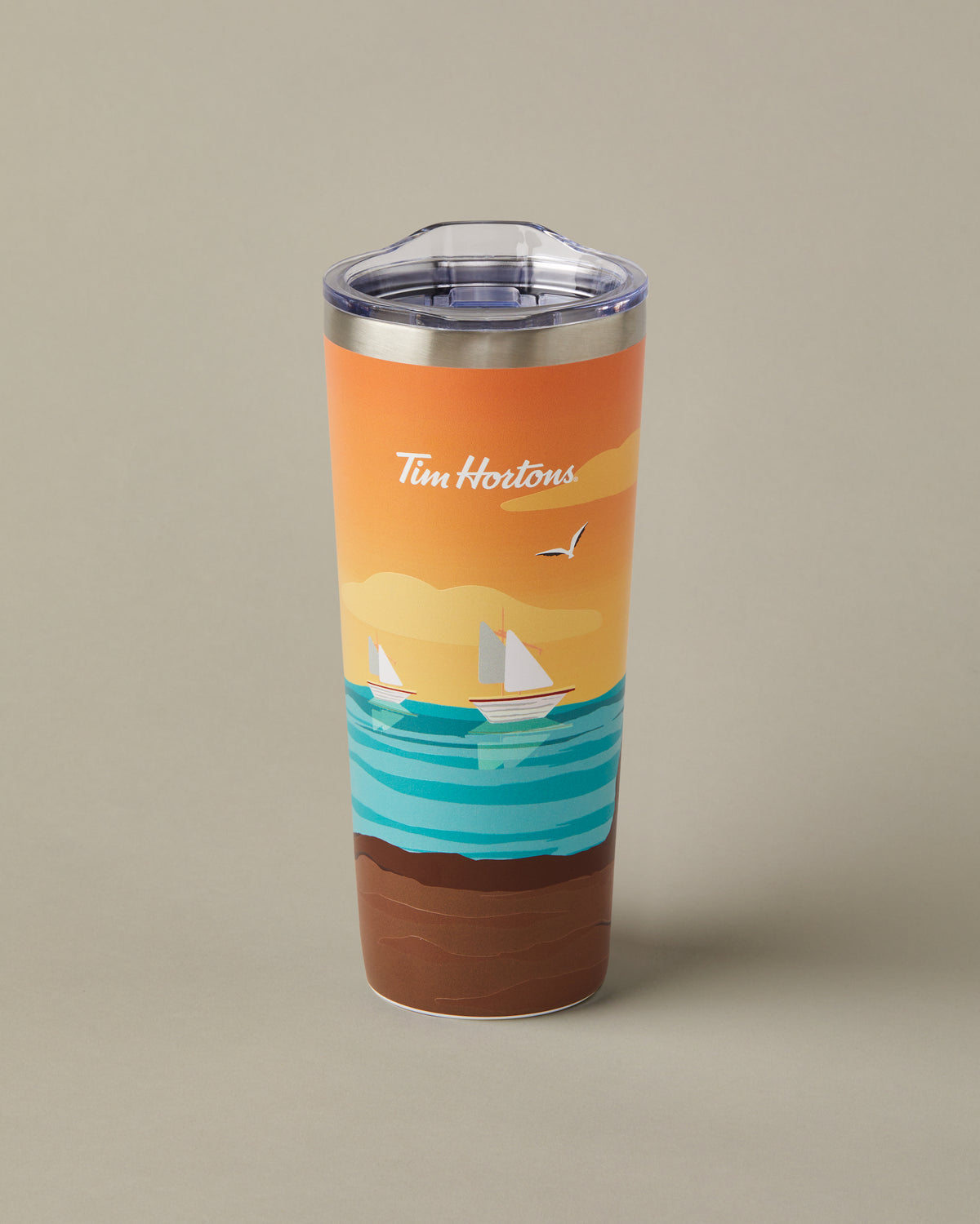 22oz stainless steel Tim Hortons travel mug with New Brunswick landscape design, insulated for hot and cold drinks | Gobelet de voyage en acier inoxydable Tim Hortons de 22 oz représentant des paysages du Nouveau-Brunswick, isotherme pour boissons chaudes et froides. - Image #2