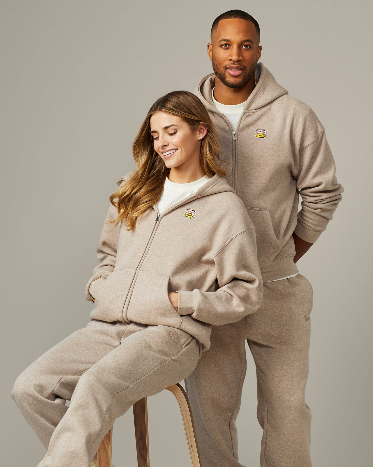 Unisex full zip hoodie in Iced Capp® marl colour with retro Tim Hortons logo | Chandail à capuchon unisexe à glissière gris chiné cappuccino glacé avec logo Tim Hortons rétro. - Image #1