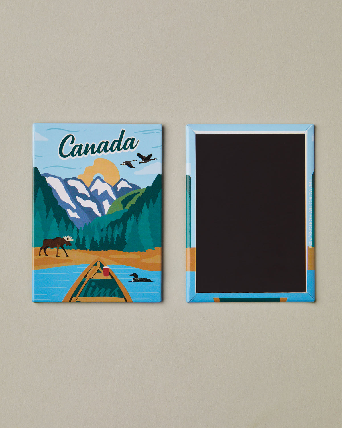 Graphic art magnet featuring stylized Canadian landscapes with Tim Hortons iconography | Aimant au design artistique mettant en vedette des paysages canadiens stylisés et l’iconographie de Tim Hortons. - Image #1