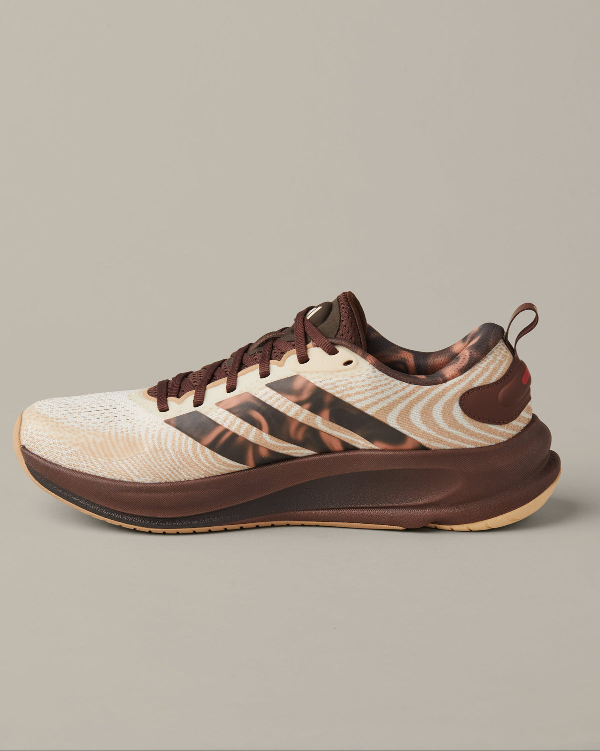 Men’s adidas® Supernova Ease running shoes in cream and coffee-brown shades with patterned 3-Stripes and Tim Hortons details. - Image #3